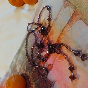 (A6) Purple see-through beaded necklace.....